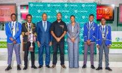 The winning Marist Brothers High School team poses with Old Mutual Zimbabwe Group Chief Operations Officer, Isiah Mashinya (third from left) and Primary and Secondary education deputy minister Angeline Gata (fifth)